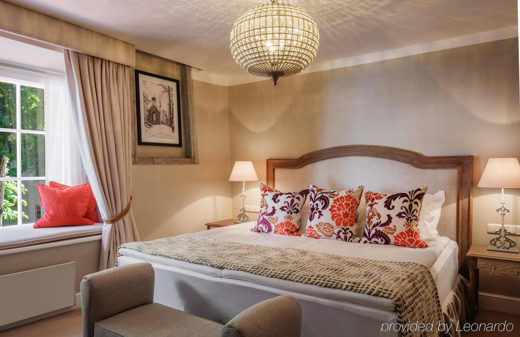 斯古拉萨尔酒店 - 立鼎世酒店集团 塔林 外观 照片 A bedroom at the hotel